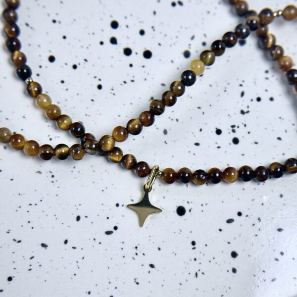 Tigro akies vėrinys